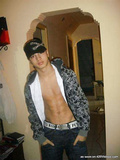 Sexy young gay is looking hot on his pictures