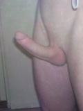 Young gay dude is standing nude in hot pose