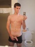 Sleder shaped gay is photographing himself