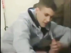Young gayboys on sofa in parents house
