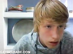 Blonde boy with long hair shows us his ass