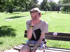 Young sexy shaped guy is sitting on the bench and getting seduced