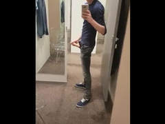 Pretty young twink is standing in front of the mirror and jerking off