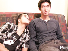 Asian twink watches gay porn video with white friend and enjoys fucking hard