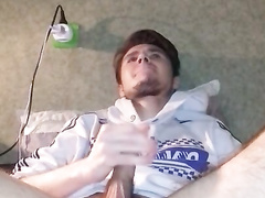 Redhead fag is passionately masturbating big dick in front of the webcam
